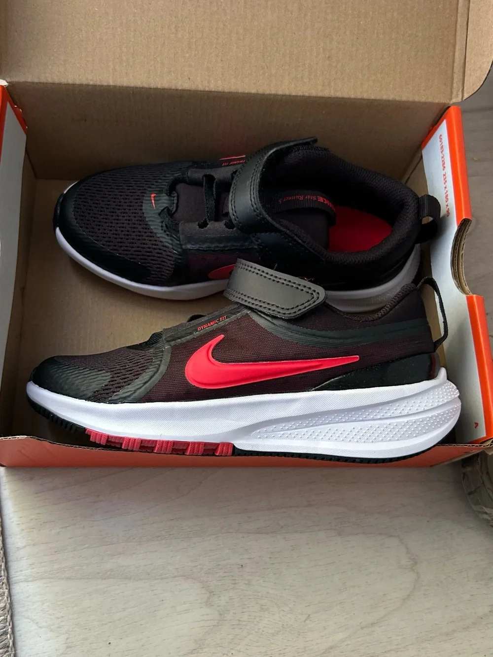 Nike Kids Black Sneakers with Red Accents